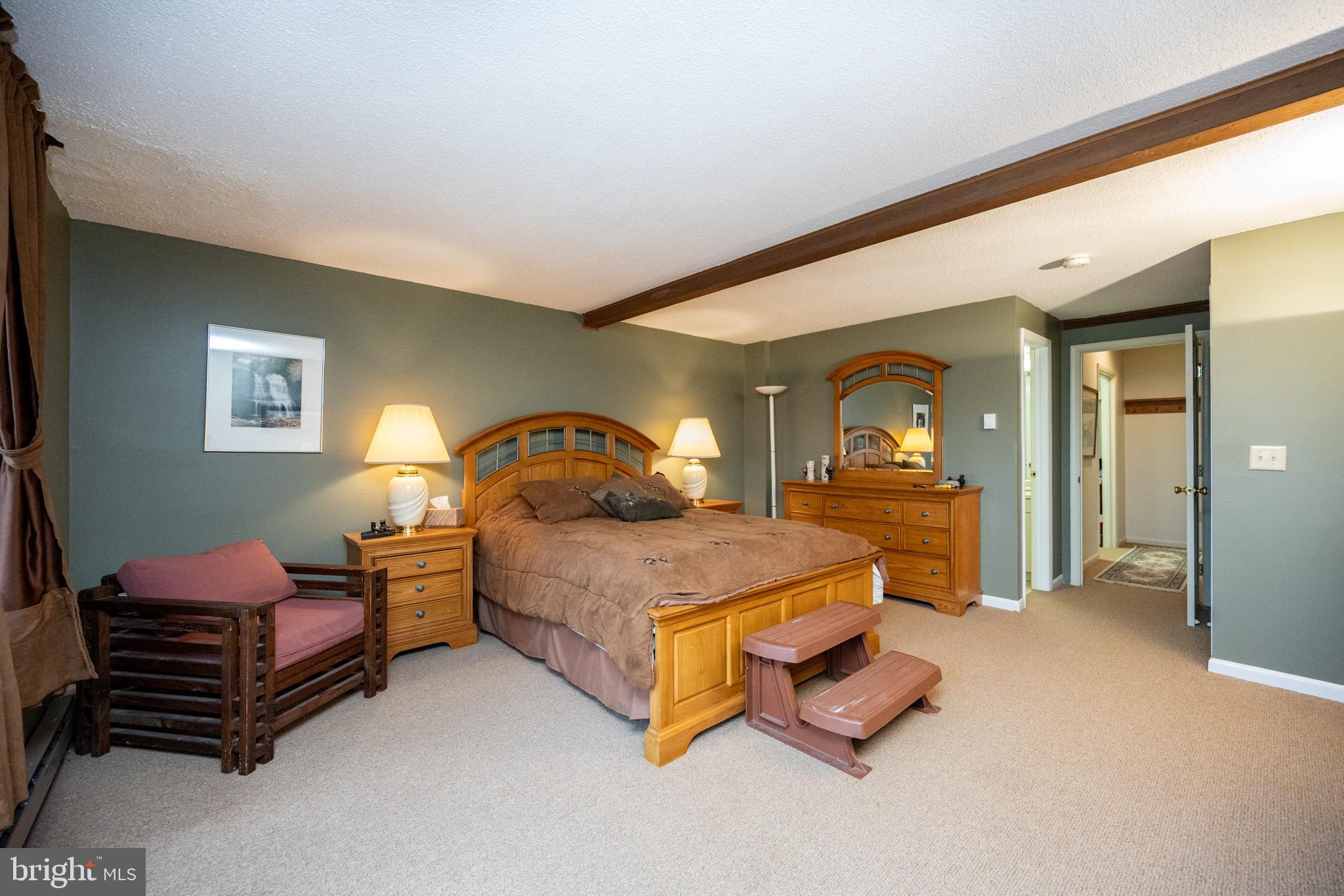 7 Winding Way, Unit 12B McHenry, MD 21541 - Photo 23 of 44 a bedroom with bed and window