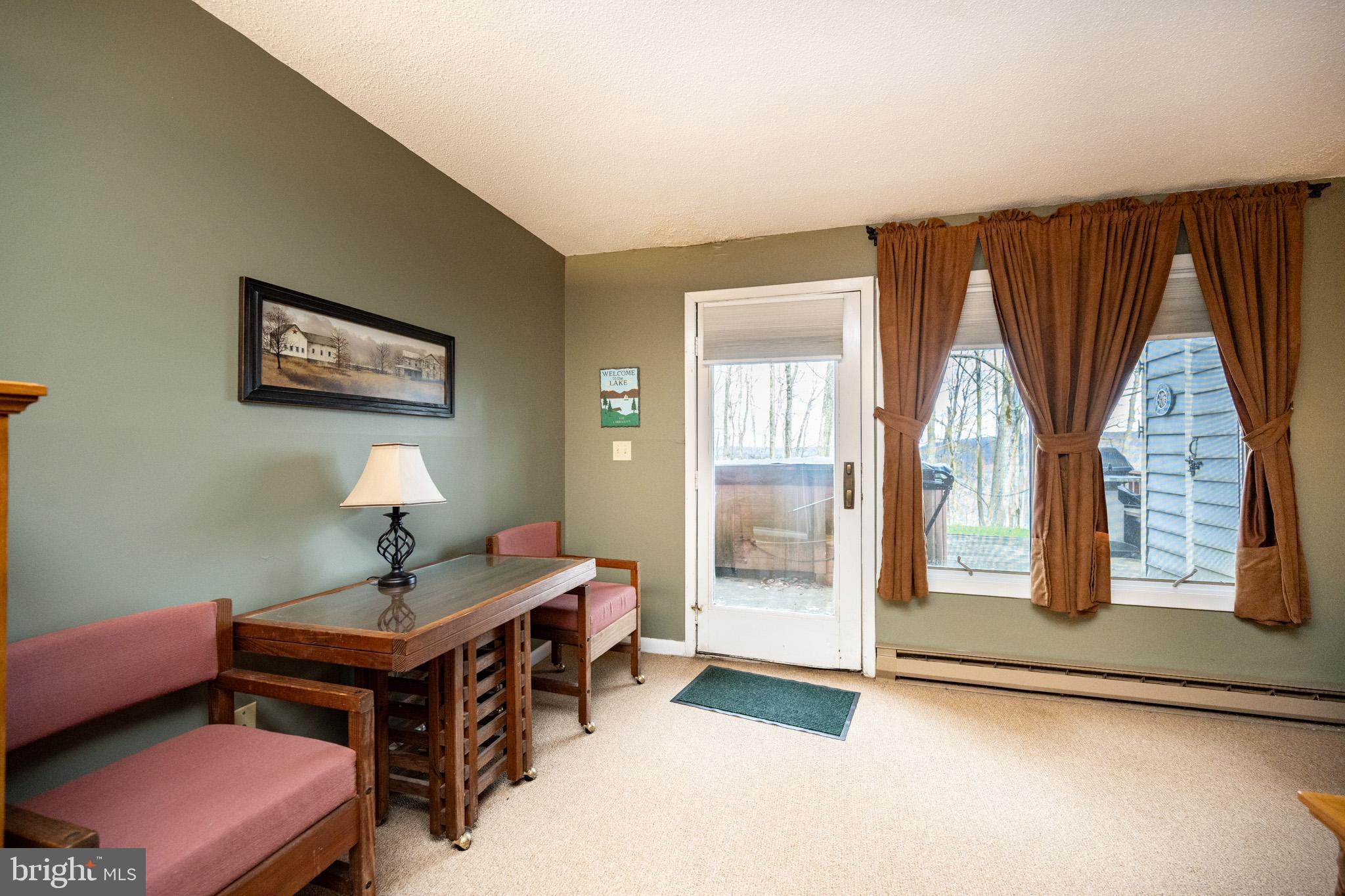 7 Winding Way, Unit 12B McHenry, MD 21541 - Photo 28 of 44 a living room with furniture
