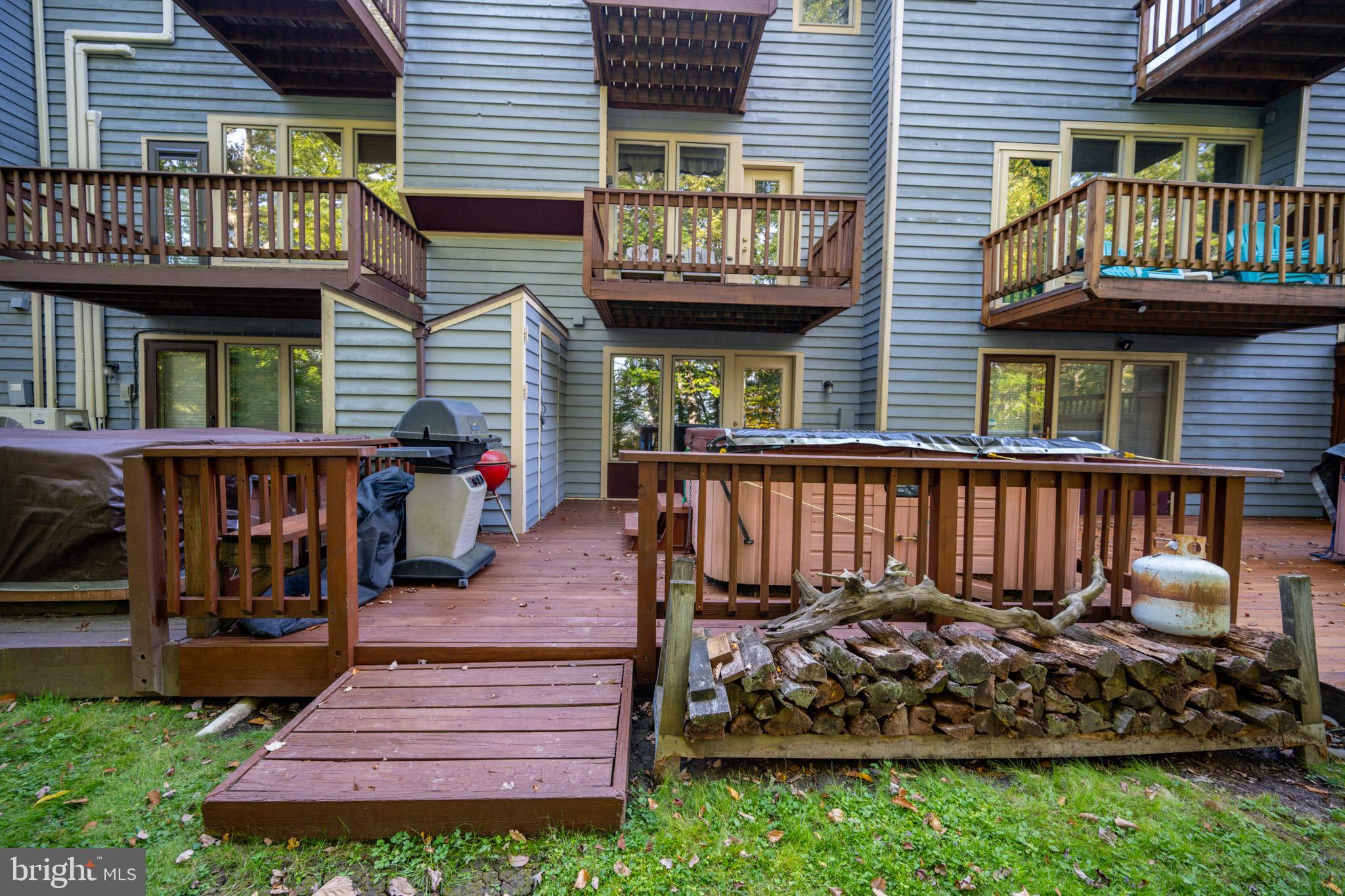 7 Winding Way, Unit 12B McHenry, MD 21541 - Photo 34 of 44 a front view of a house with a deck