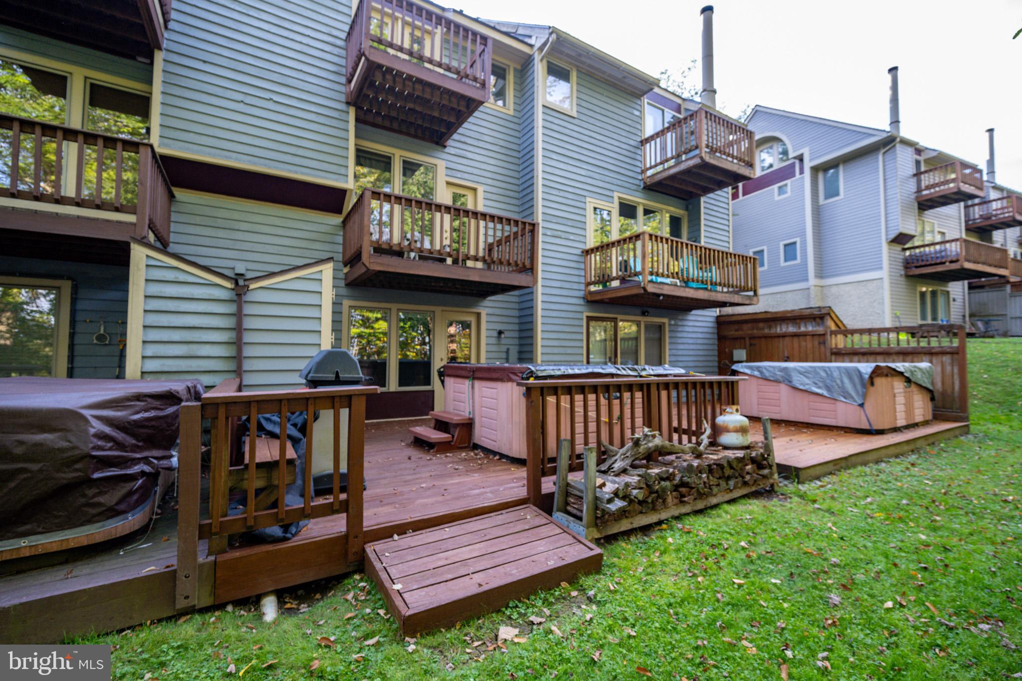 7 Winding Way, Unit 12B McHenry, MD 21541 - Photo 35 of 44 a view of a chairs setting on the deck