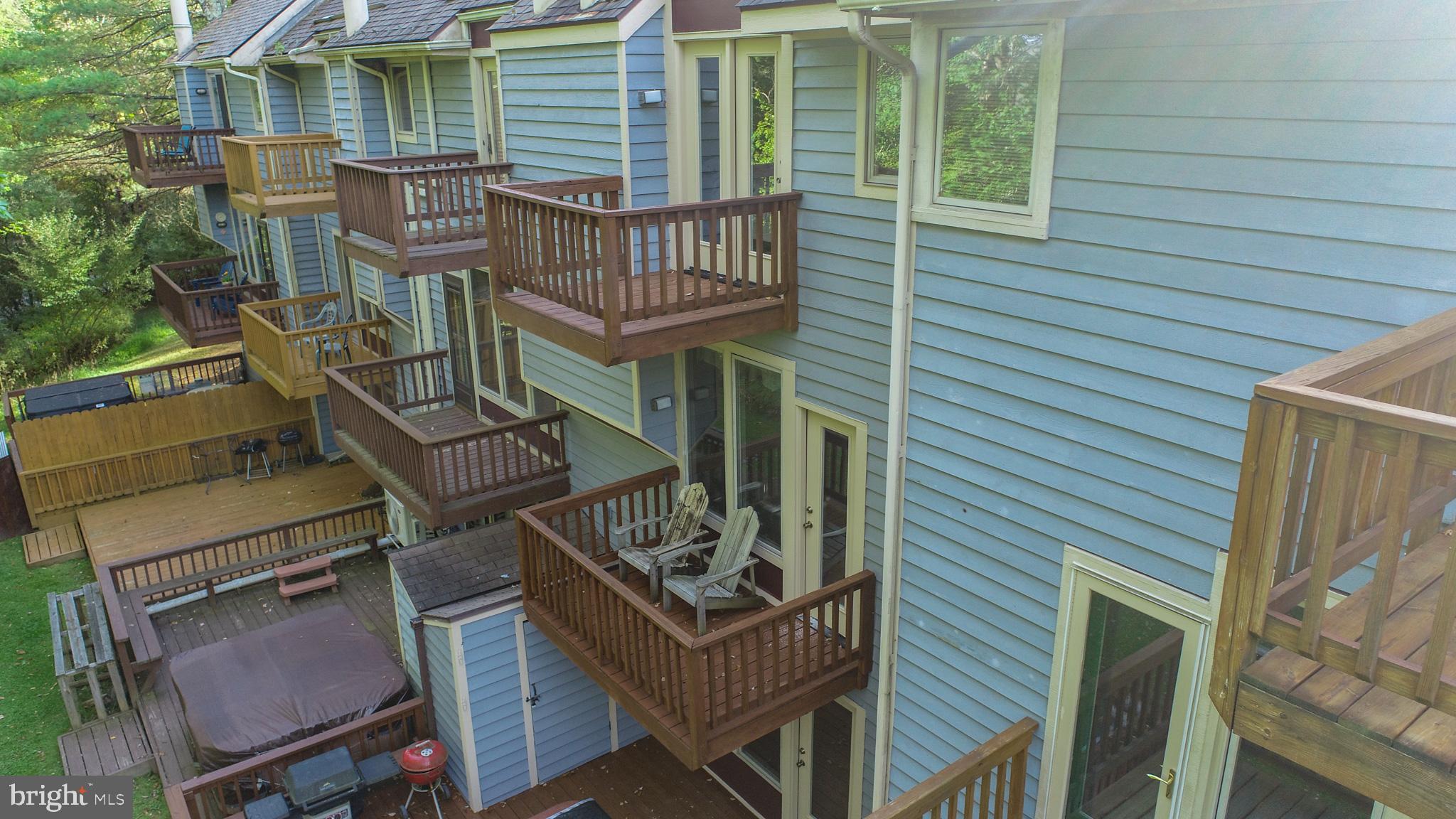 7 Winding Way, Unit 12B McHenry, MD 21541 - Photo 41 of 44 a balcony with table and chairs