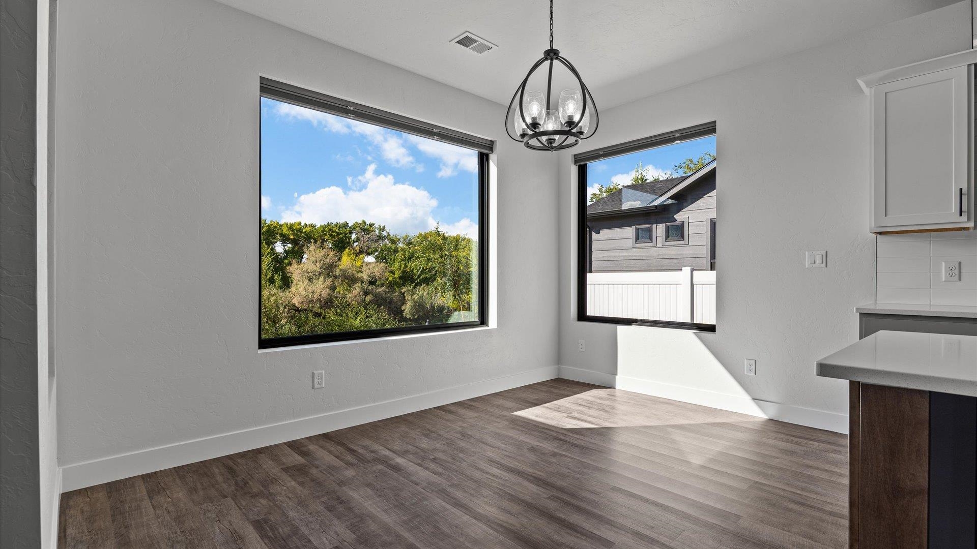745 Fairhaven Road Palisade, CO 81526 - Photo 14 of 33 a view of empty room with wooden floor and fan
