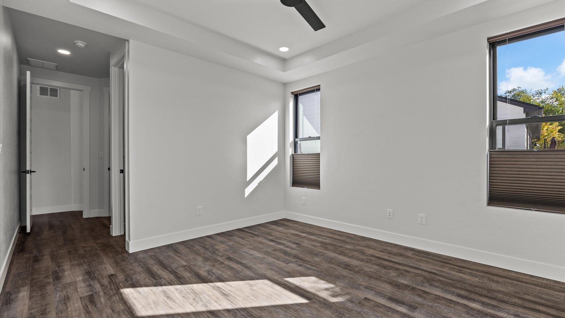 745 Fairhaven Road Palisade, CO 81526 - Photo 16 of 33 wooden floor in an empty room with a window