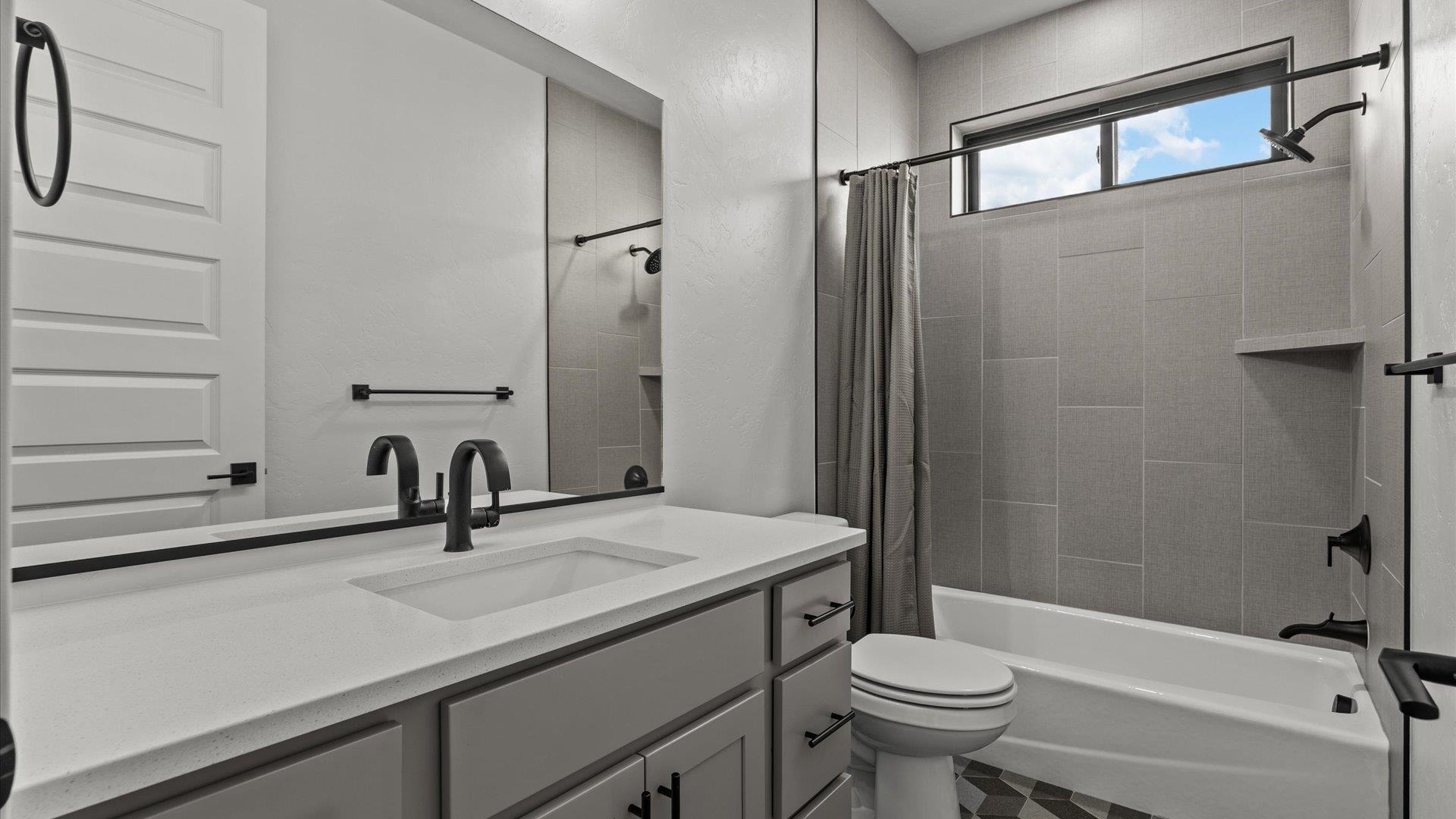 745 Fairhaven Road Palisade, CO 81526 - Photo 21 of 33 a bathroom with a sink toilet and shower