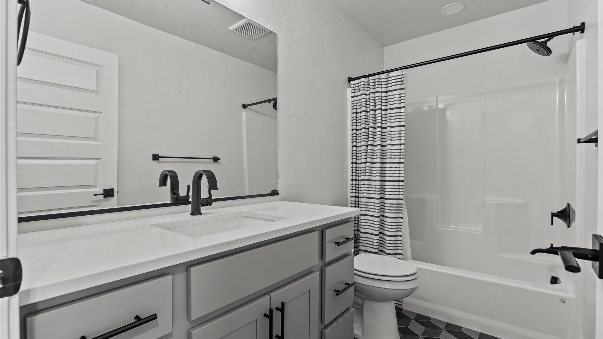 745 Fairhaven Road Palisade, CO 81526 - Photo 25 of 33 a bathroom with a sink toilet and shower