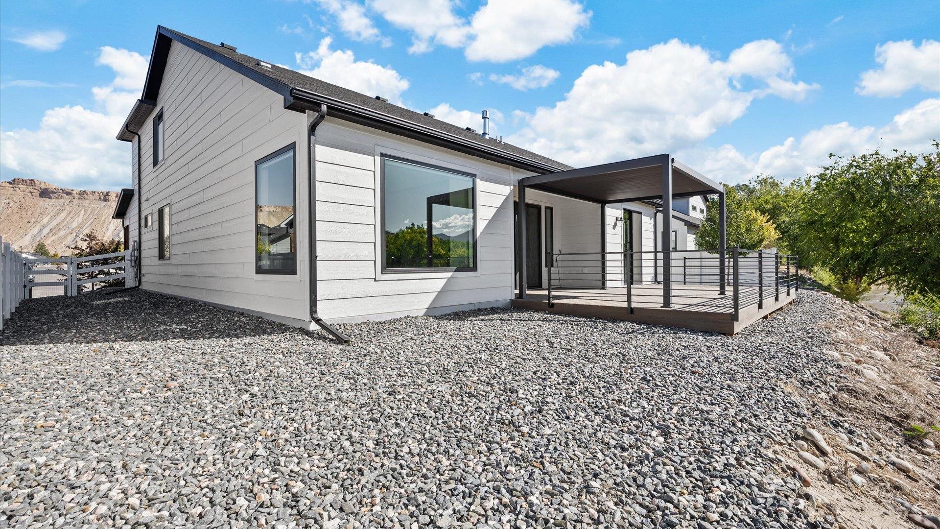 745 Fairhaven Road Palisade, CO 81526 - Photo 29 of 33 a front view of a house with a garden