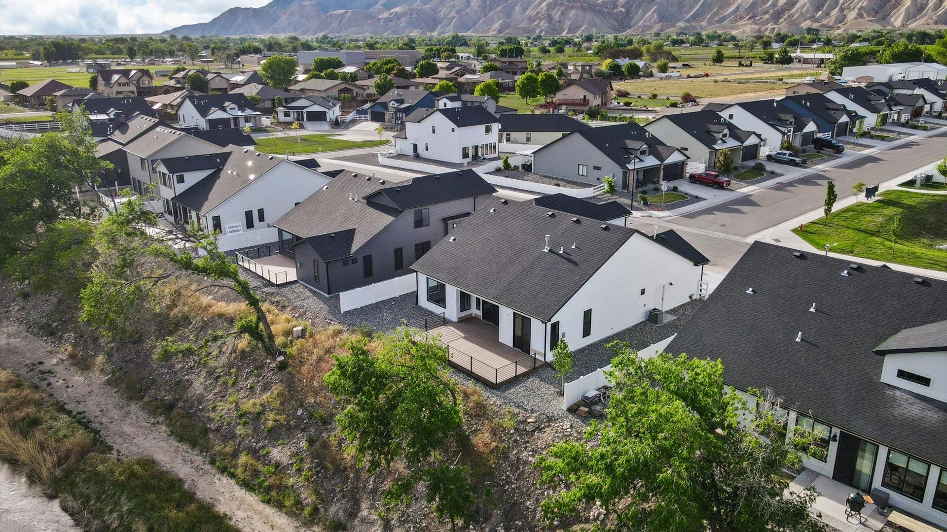 745 Fairhaven Road Palisade, CO 81526 - Photo 32 of 33 an aerial view of a house with a swimming pool yard and outdoor seating