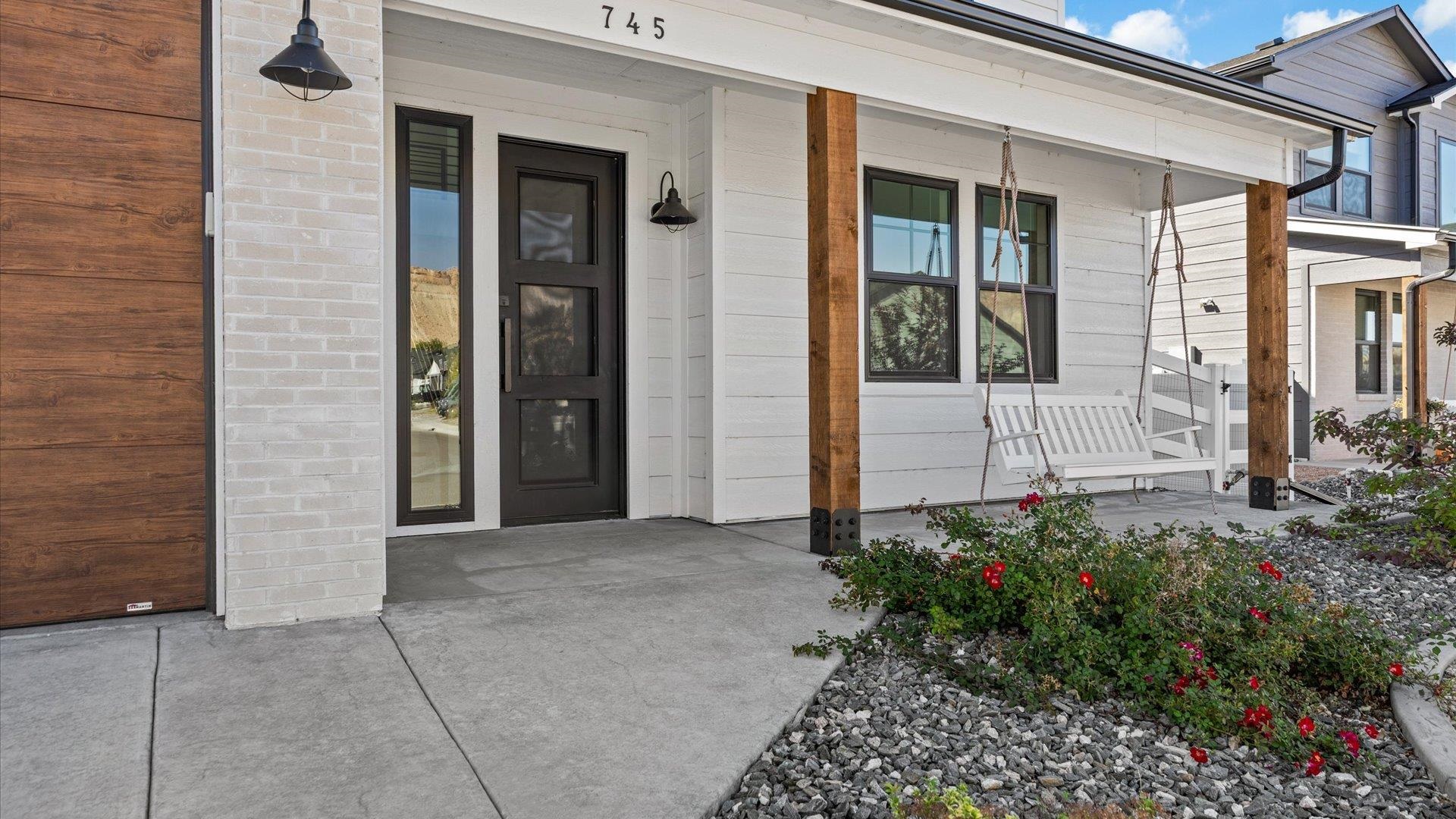 745 Fairhaven Road Palisade, CO 81526 - Photo 7 of 33 front view of a house with a small yard