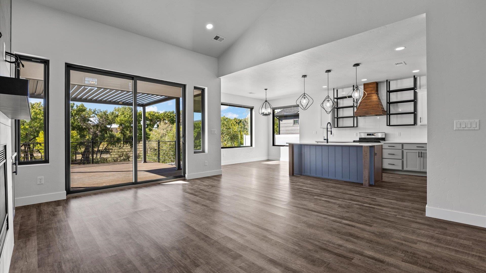 745 Fairhaven Road Palisade, CO 81526 - Photo 9 of 33 a view of kitchen with furniture and wooden floor