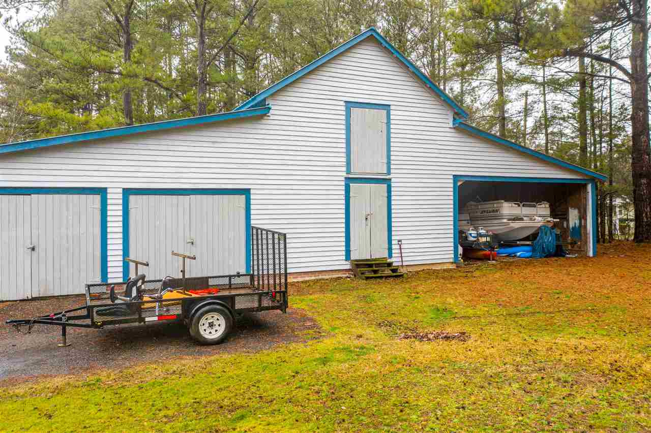 4007 Redwood Road Durham, NC 27704 - Photo 8 of 30 Two car garage, Two story workshop and RV/Boat parking. Barn/Garage