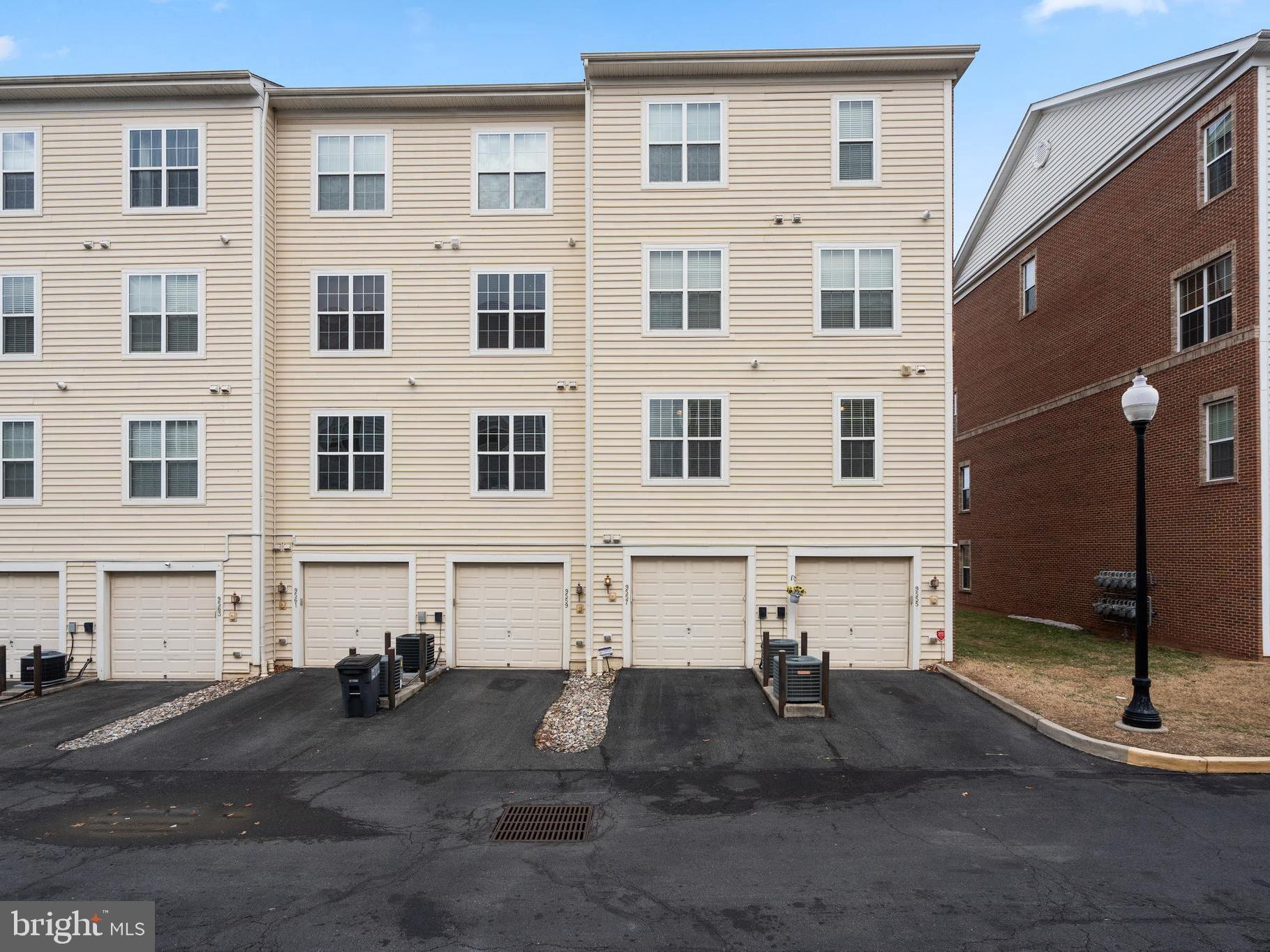9557 Center Street Manassas, VA 20110 - Photo 17 of 17 Rear Single Car Garage with Driveway