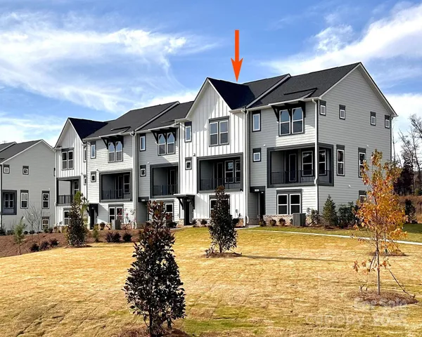 a view of a building with a swimming pool