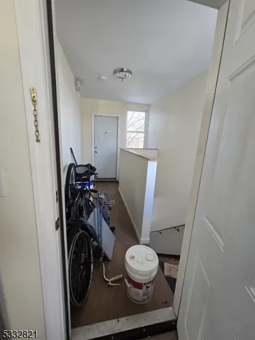a bathroom with a toilet and a mirror