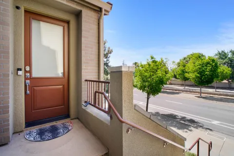 a view of a balcony with an outdoor space