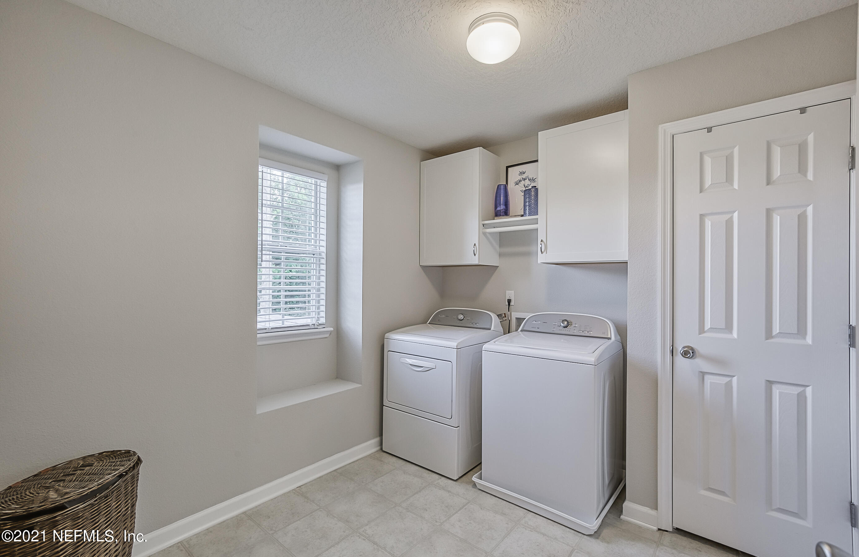 9686 Wexford Chase Road Jacksonville, FL 32257 - Photo 18 of 45 Spacious laundry room with storage