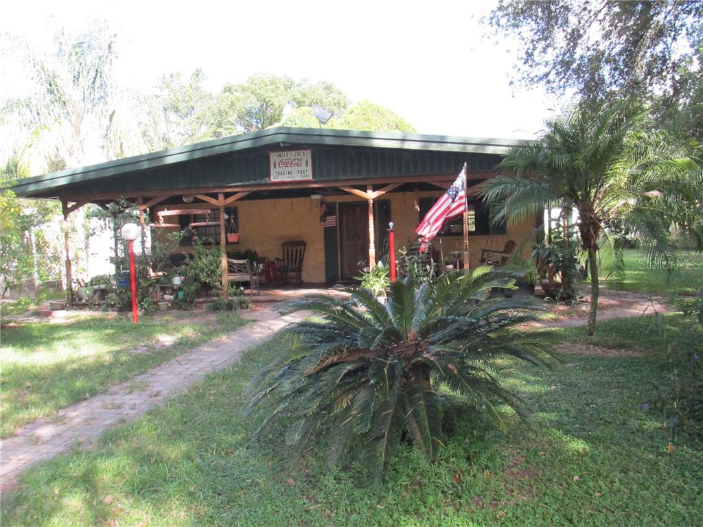 Front View of Home with porch - .48 acre MOL