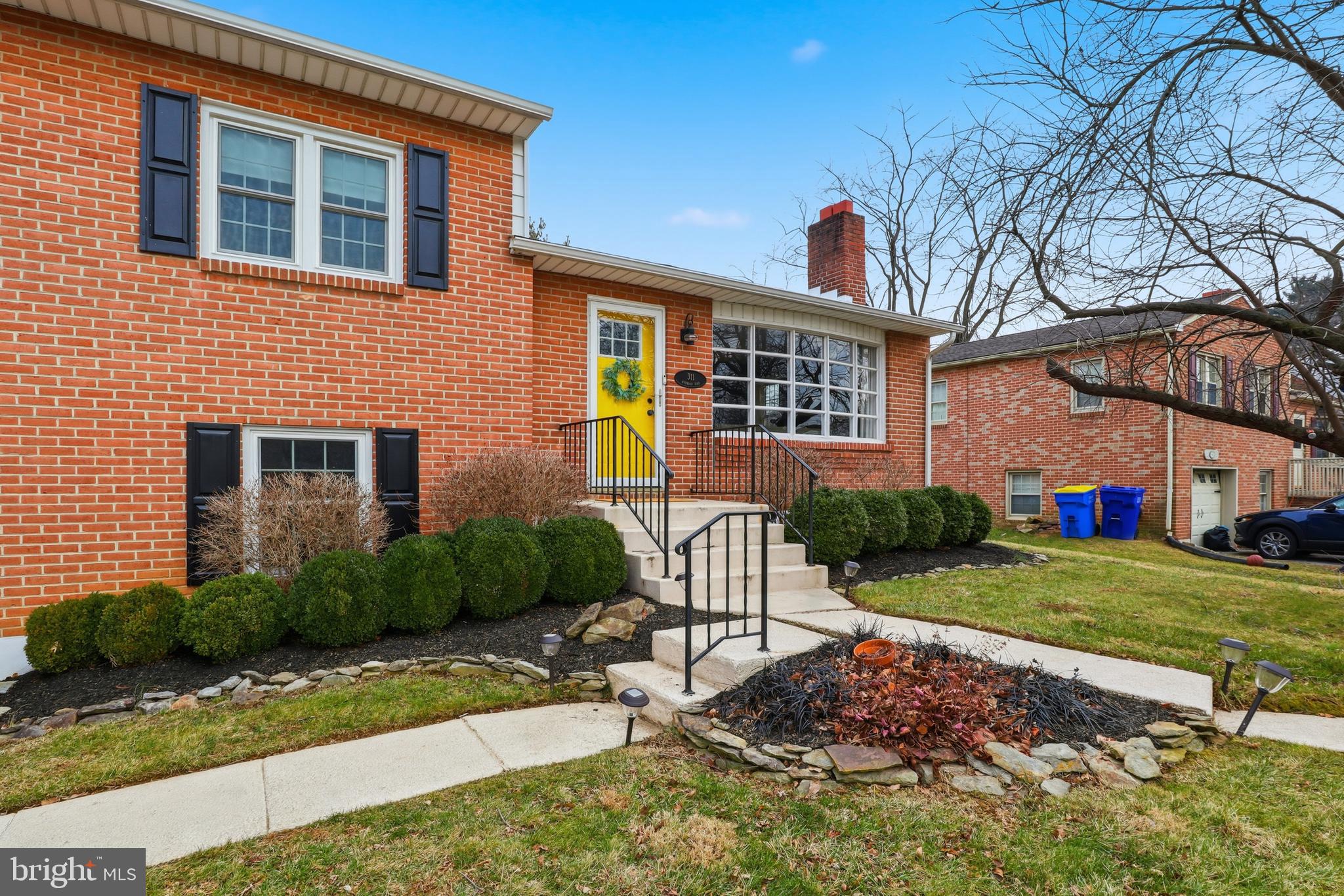 311 Wynwood Road York, PA 17402 - Photo 5 of 59 Two lead walks to the front door