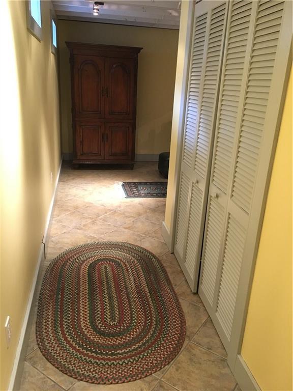 52 Cross Road Alna, ME 04535 - Photo 29 of 32 Basement hallway with closet doors...