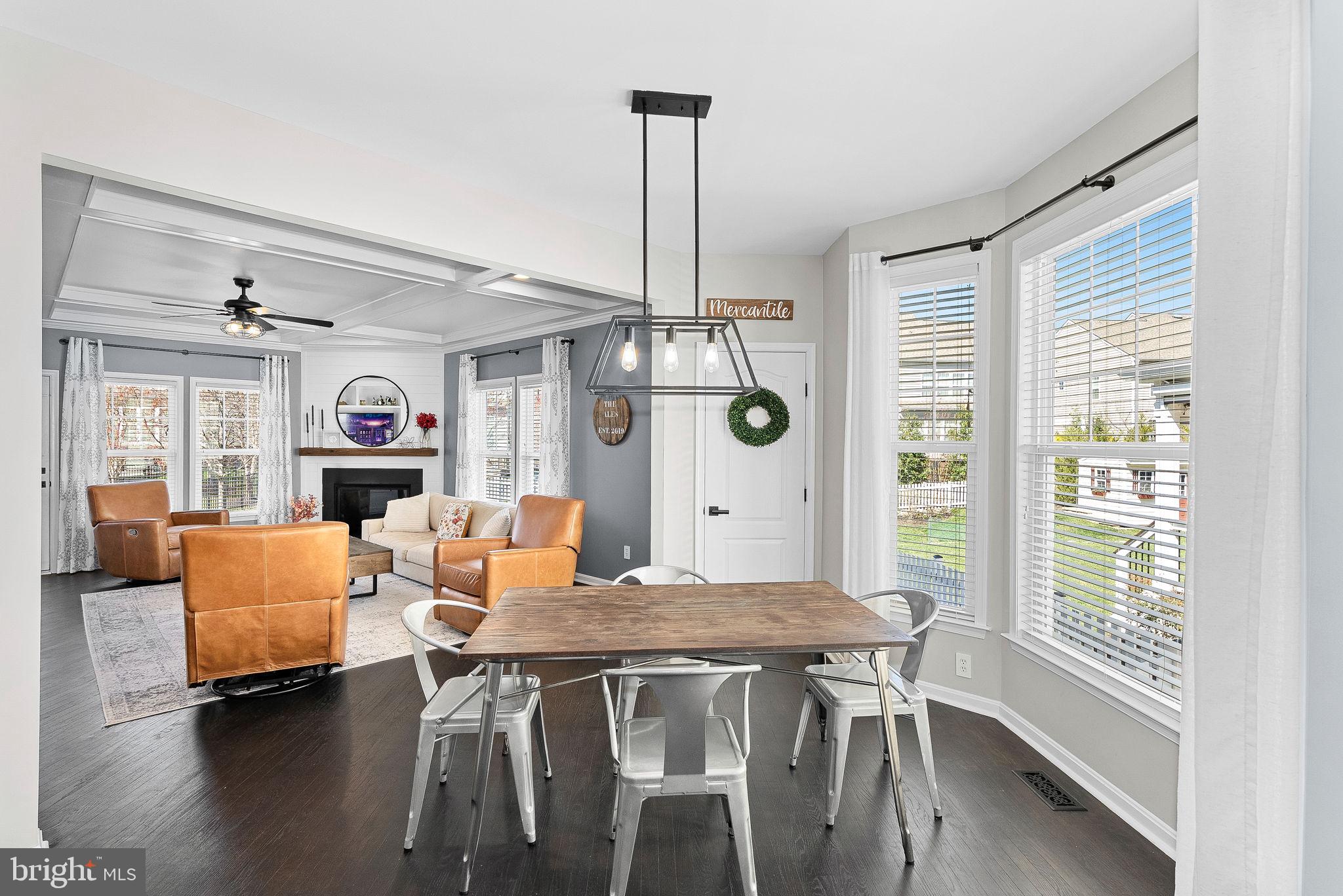 23388 Minerva Drive Brambleton, VA 20148 - Photo 16 of 57 a dining room with furniture and a window