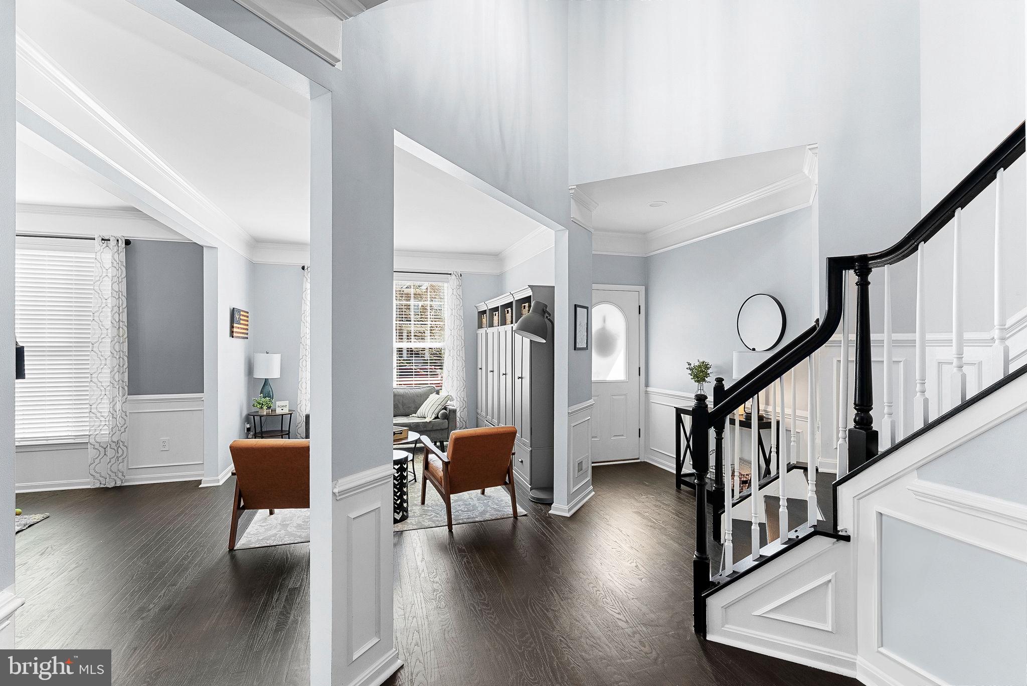 23388 Minerva Drive Brambleton, VA 20148 - Photo 3 of 57 a view of a livingroom with furniture and hardwood floor