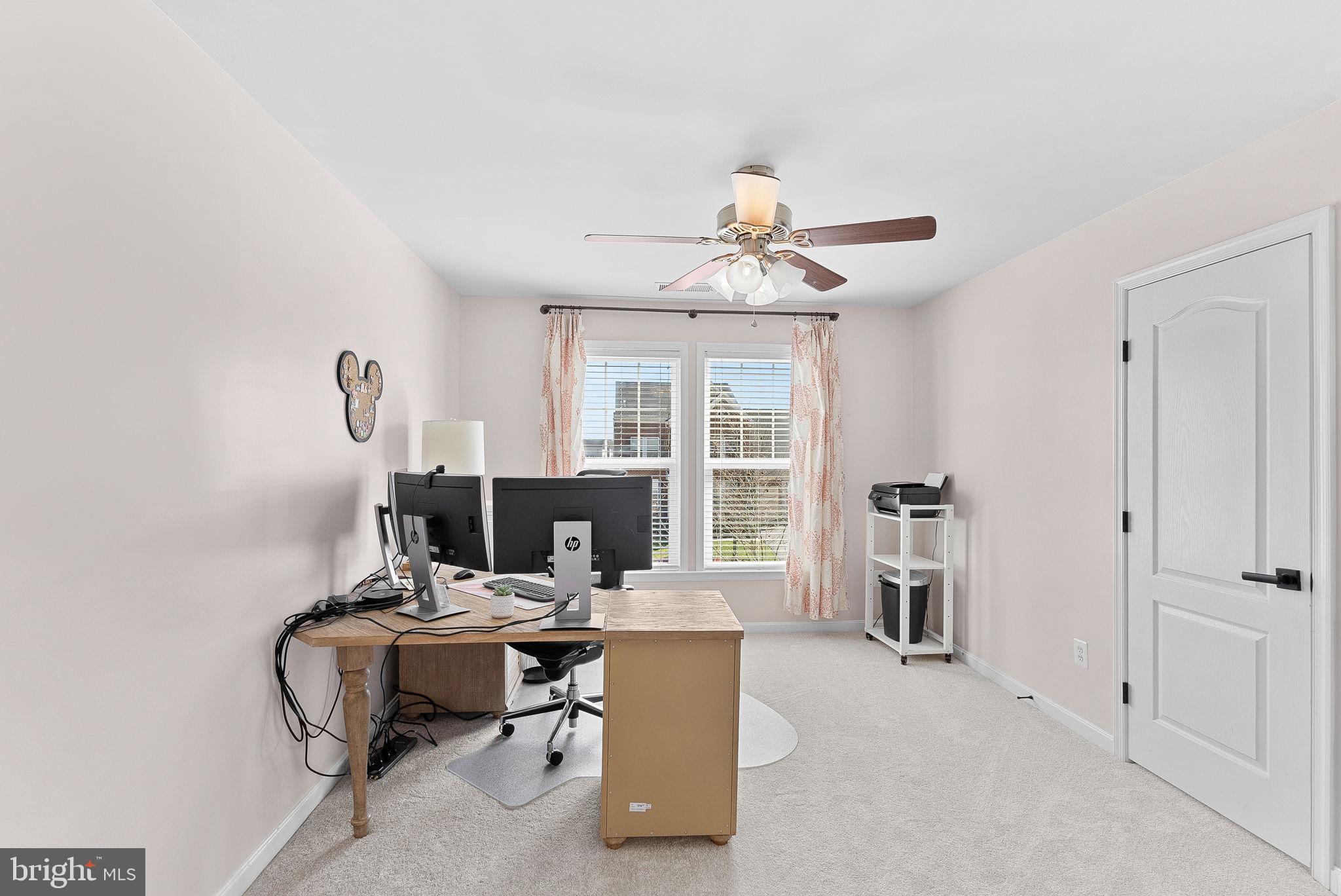 23388 Minerva Drive Brambleton, VA 20148 - Photo 32 of 57 a view of a workspace with furniture and a window