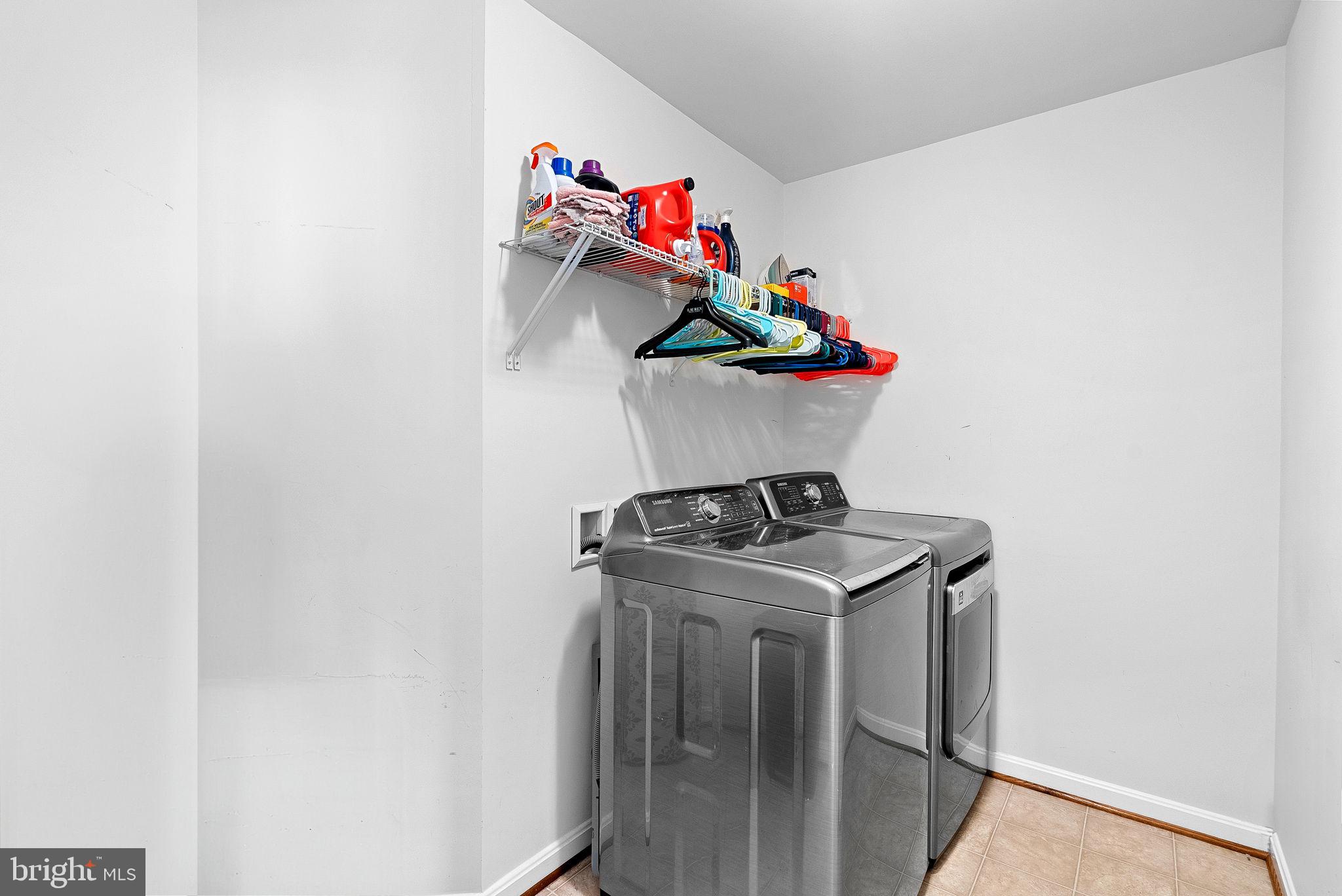 23388 Minerva Drive Brambleton, VA 20148 - Photo 38 of 57 a utility room with dryer and washer