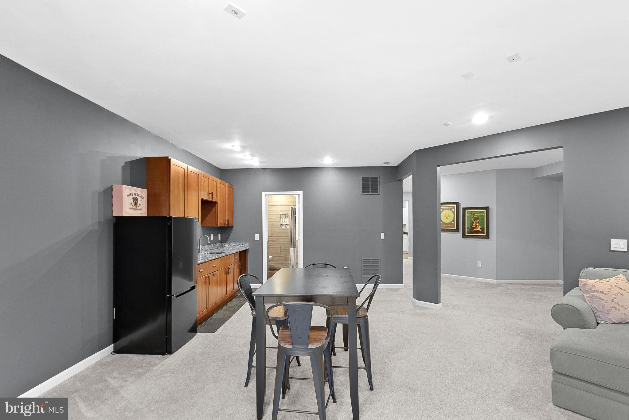 23388 Minerva Drive Brambleton, VA 20148 - Photo 43 of 57 a view of a dining room with furniture