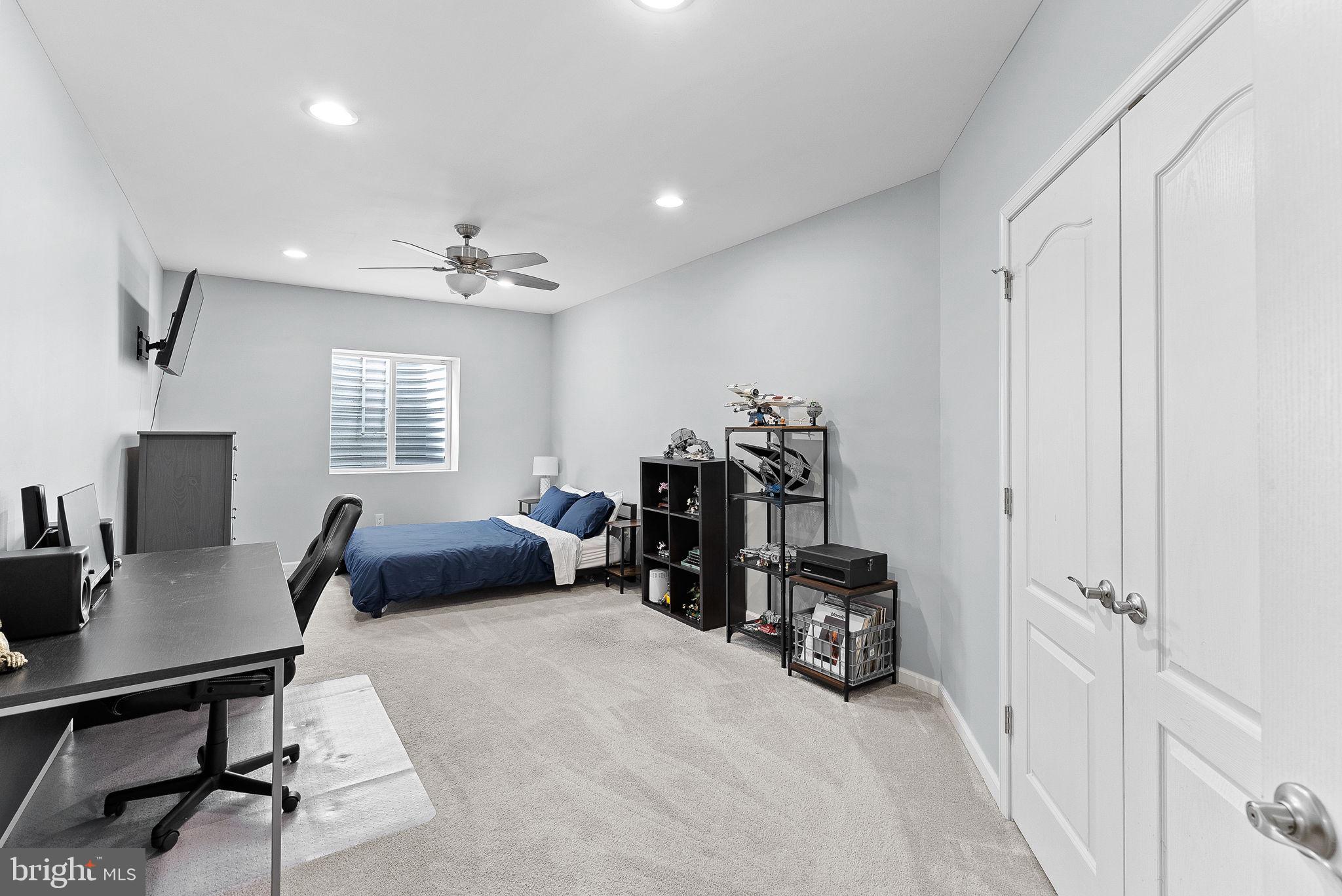 23388 Minerva Drive Brambleton, VA 20148 - Photo 46 of 57 a room with furniture and a window