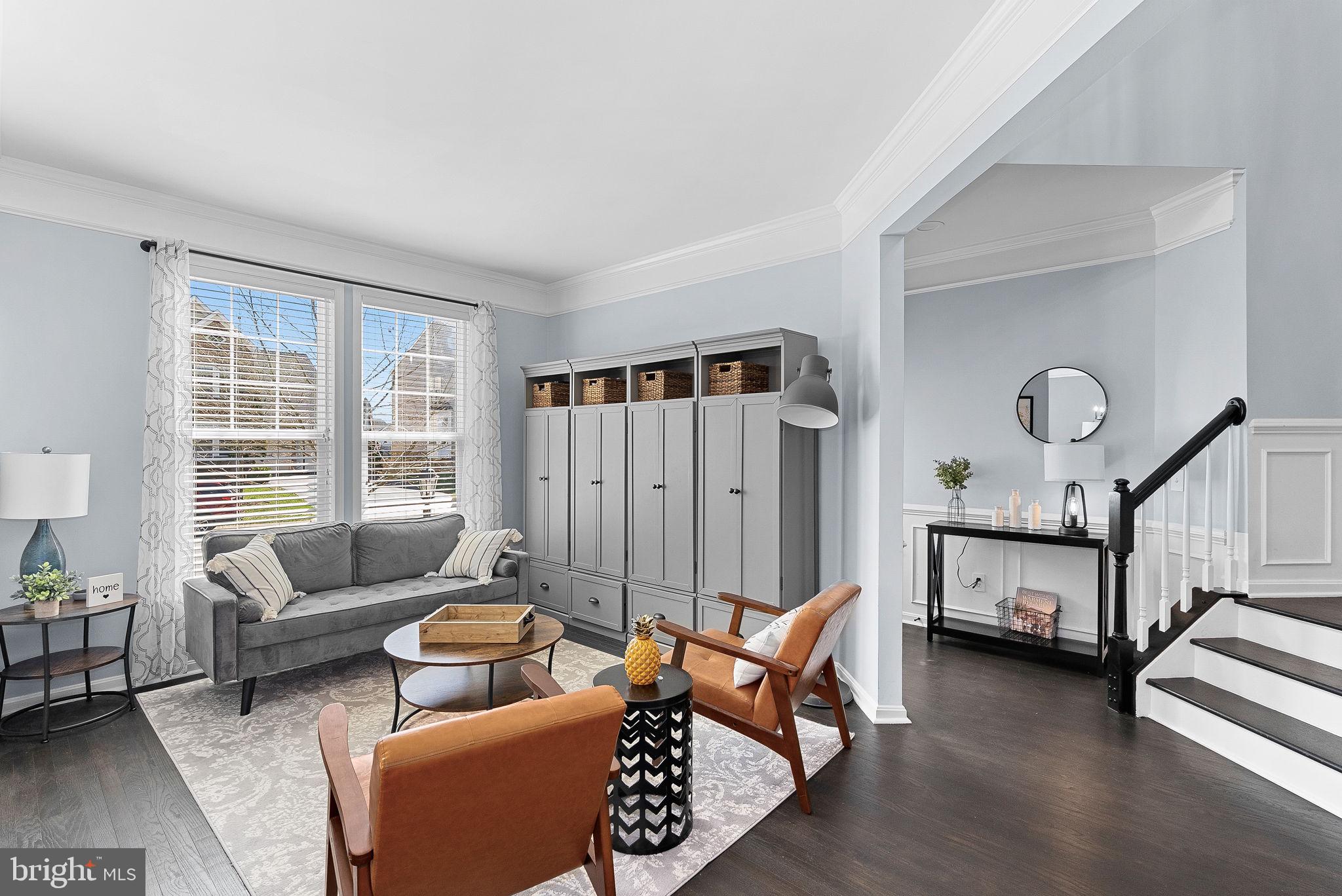 23388 Minerva Drive Brambleton, VA 20148 - Photo 5 of 57 a living room with furniture and a window