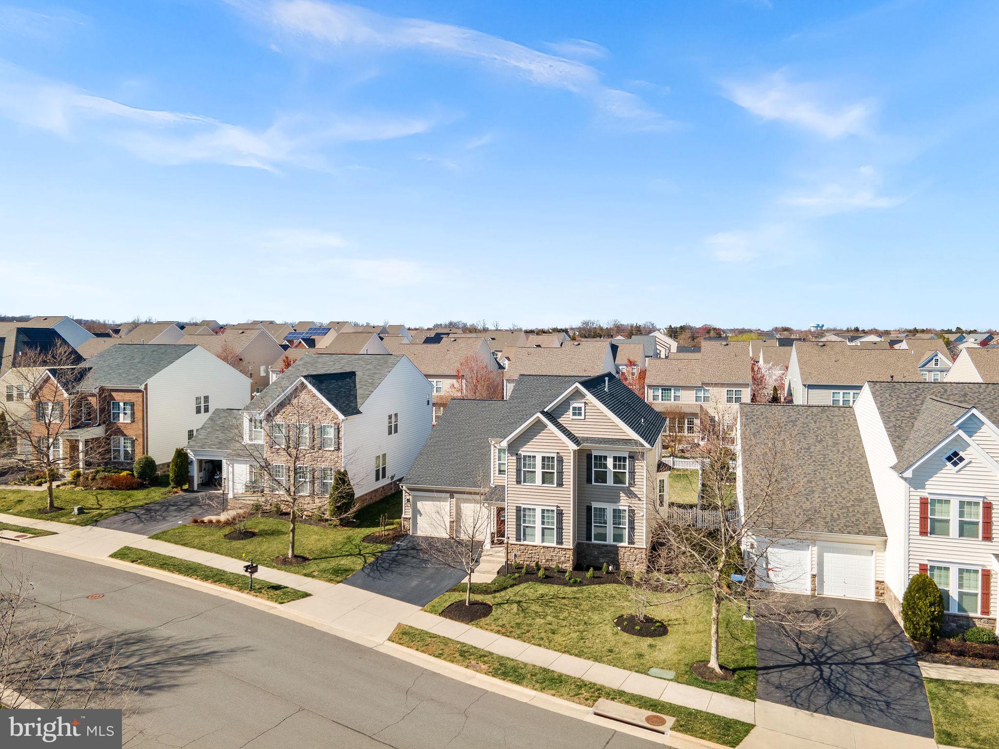 23388 Minerva Drive Brambleton, VA 20148 - Photo 54 of 57 an aerial view of residential houses and street