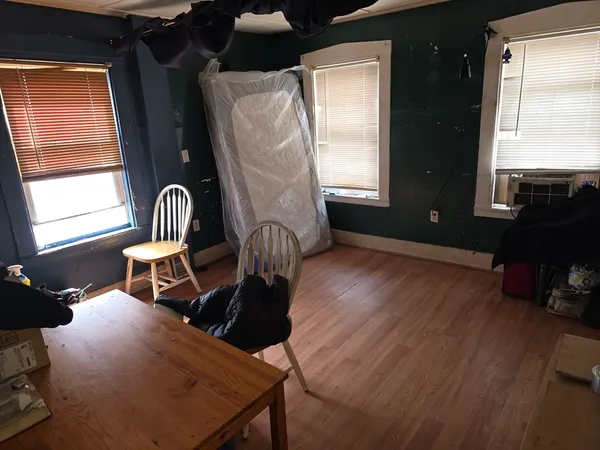 a room with furniture window and wooden floor