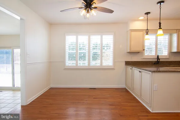 a kitchen with sink and window