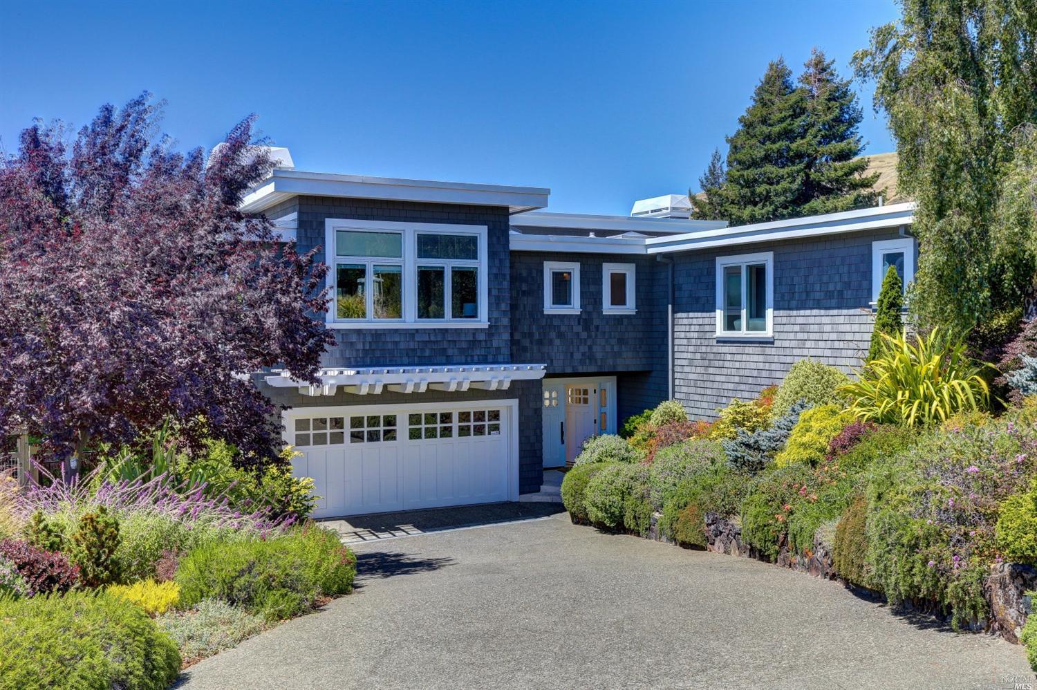 a house view with a garden space