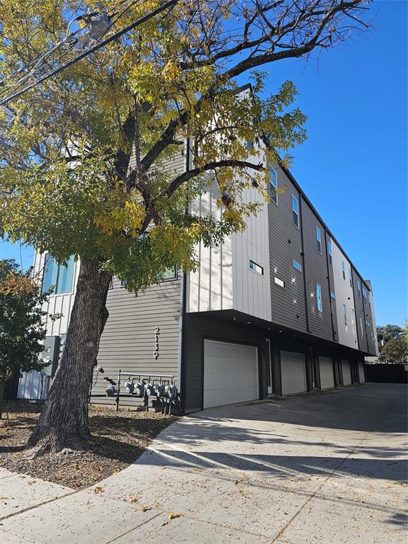 View of building exterior with a garage