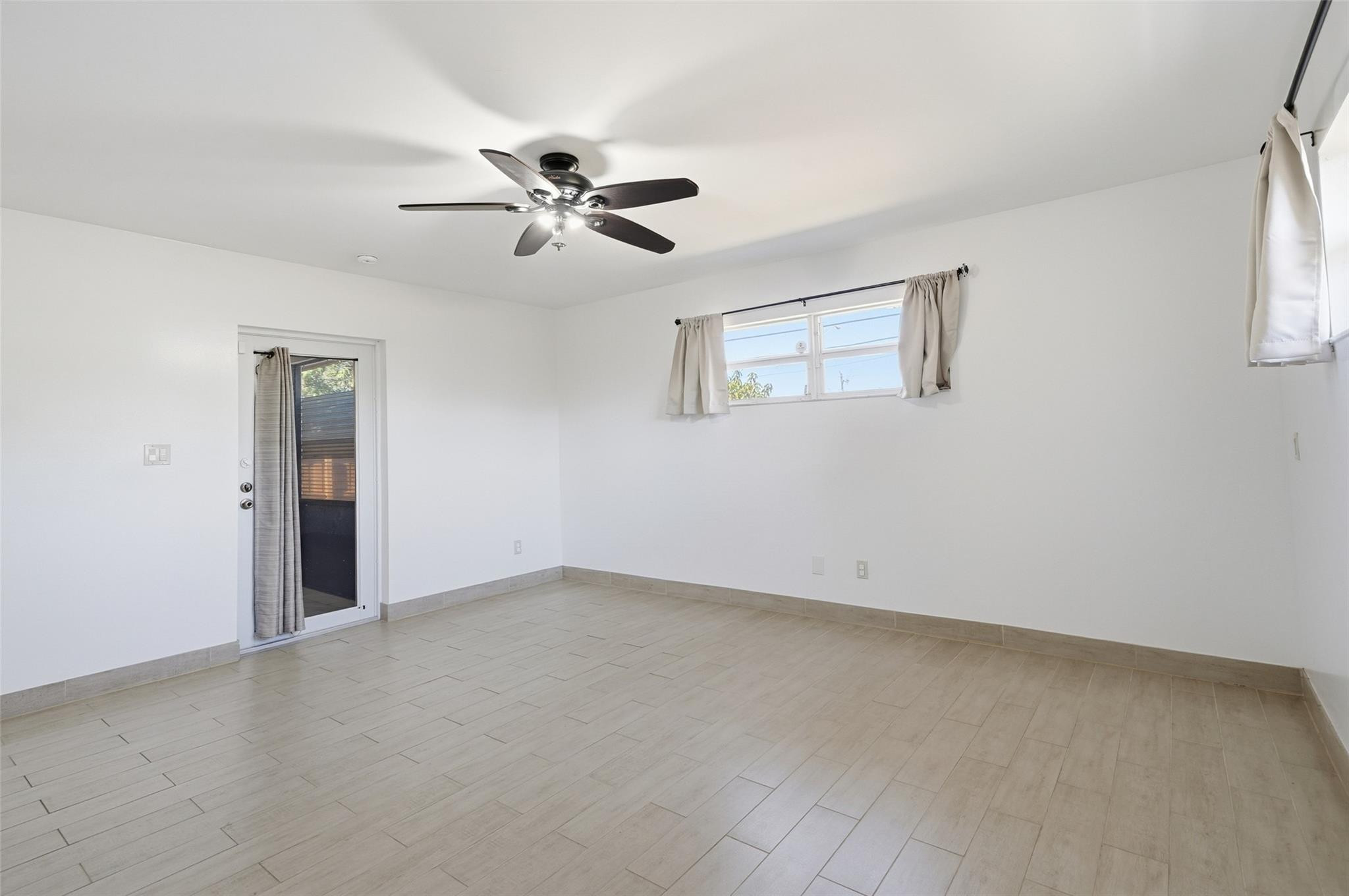 5015 Southwest 18th Street West Park, FL 33021 - Photo 22 of 39 direct door to rear patio