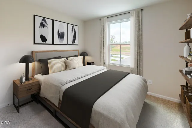 a bedroom with bed and a window