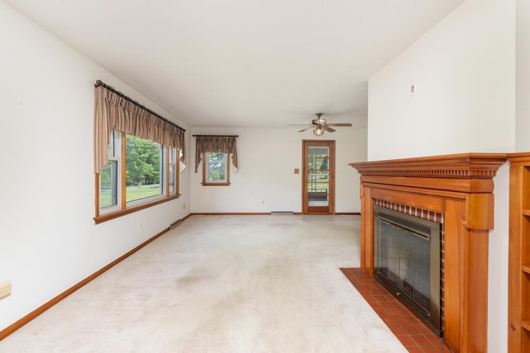 65 Dam Town Road Fort Defiance, VA 24437 - Photo 29 of 43 an empty room with windows fire place and windows
