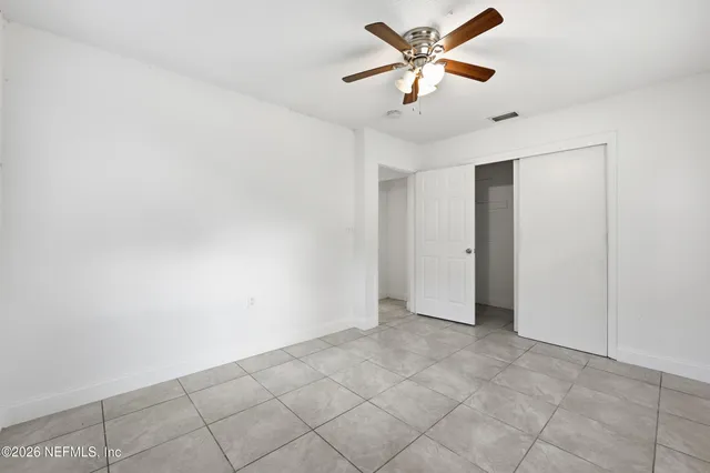 a view of backyard with tree