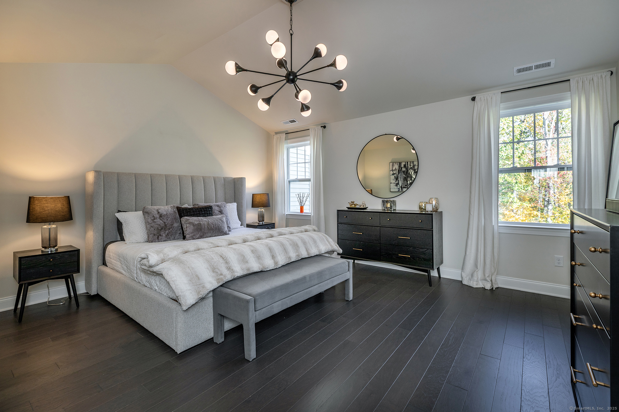 175 Ridgewood Drive, Unit 175 Middlebury, CT 06762 - Photo 13 of 21 a bedroom with a bed window and a table