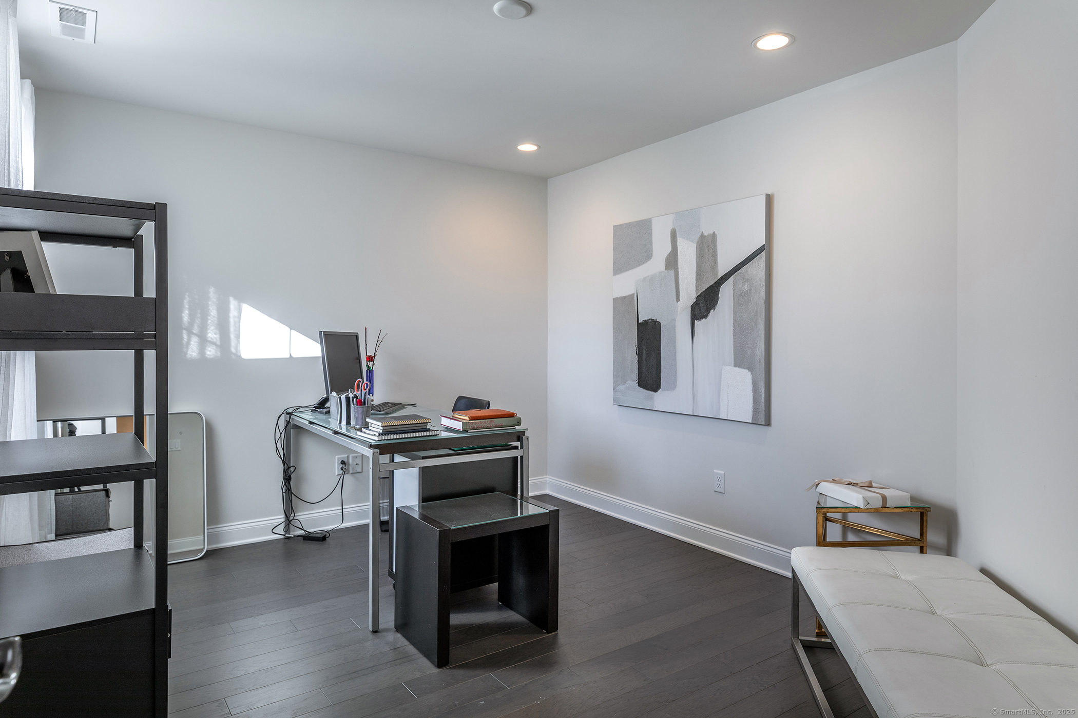 175 Ridgewood Drive, Unit 175 Middlebury, CT 06762 - Photo 16 of 21 a living room with furniture