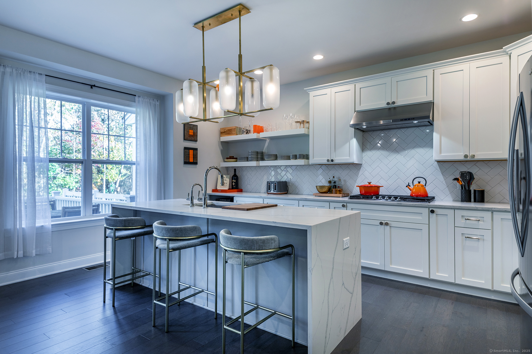 175 Ridgewood Drive, Unit 175 Middlebury, CT 06762 - Photo 9 of 21 a kitchen with stainless steel appliances granite countertop a sink a stove and a refrigerator