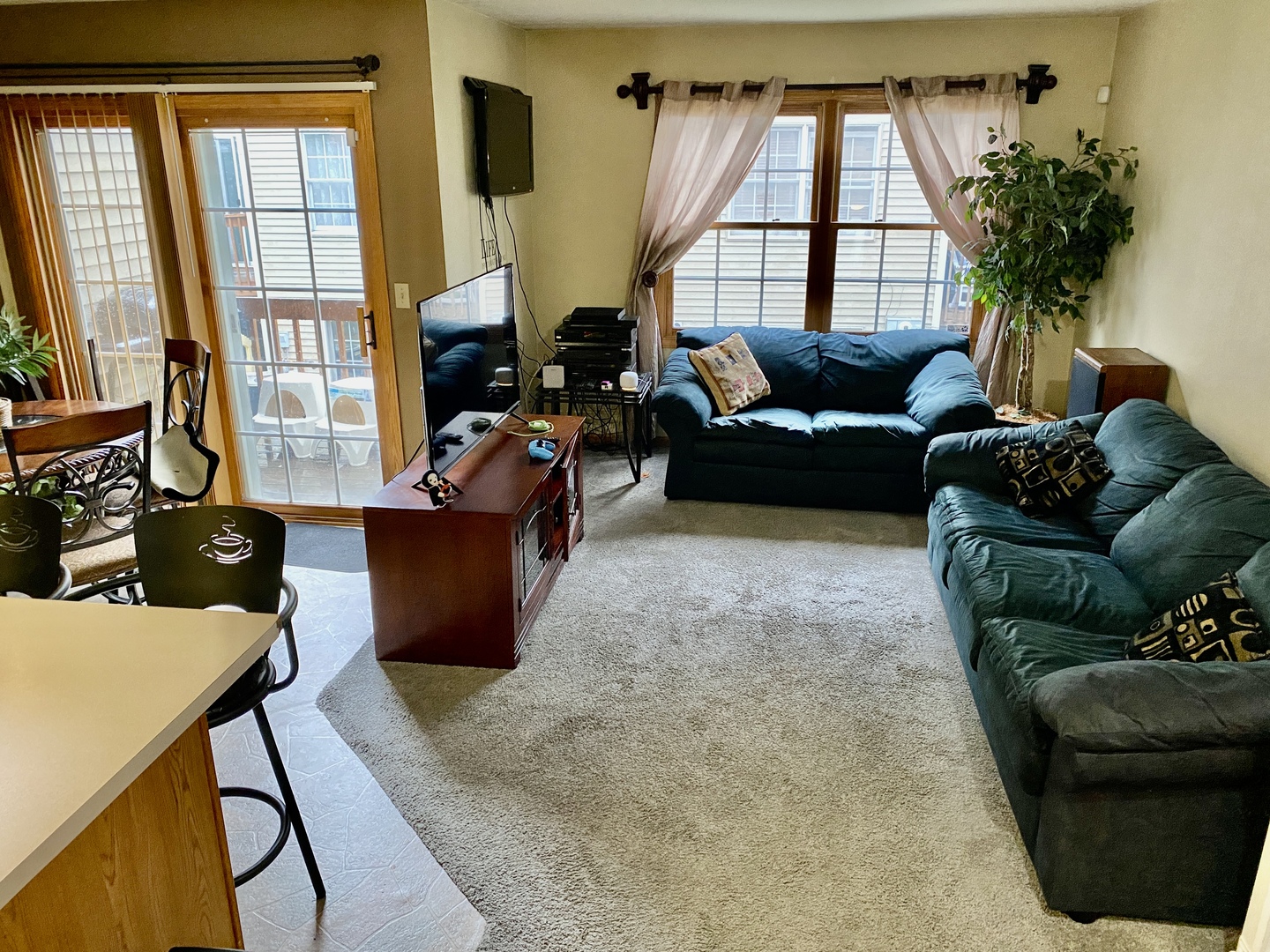 502 South Peace Road, Unit 502 Sycamore, IL 60178 - Photo 4 of 14 a living room with furniture and a large window