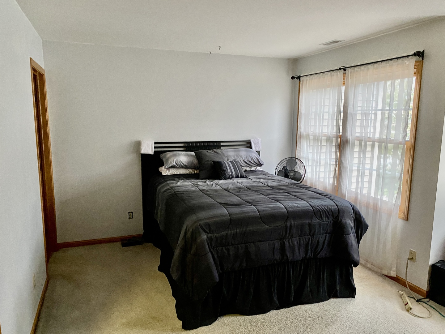 502 South Peace Road, Unit 502 Sycamore, IL 60178 - Photo 8 of 14 a bedroom with a bed and window