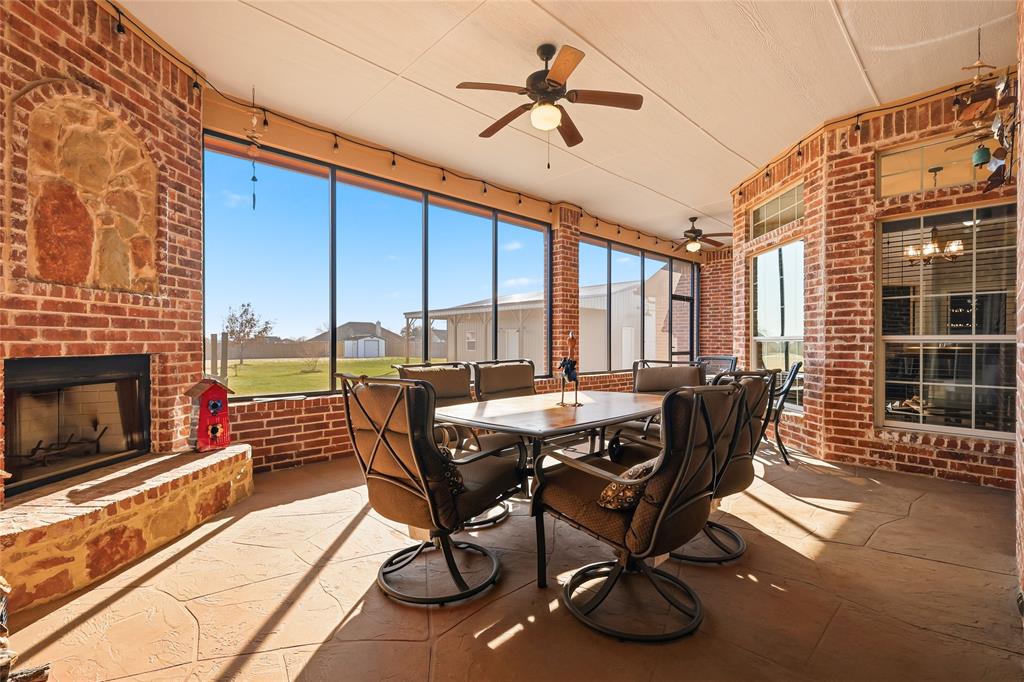 7915 Stone Ridge Drive Northlake, TX 76247 - Photo 25 of 40 a view of a patio with a table and chairs