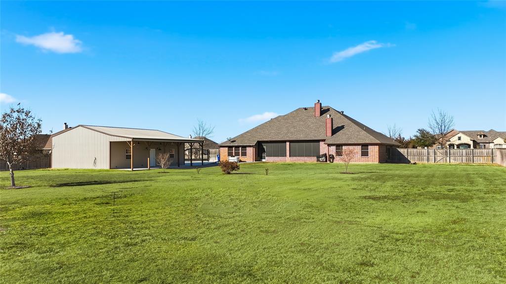 7915 Stone Ridge Drive Northlake, TX 76247 - Photo 28 of 40 a view of a big yard with a house