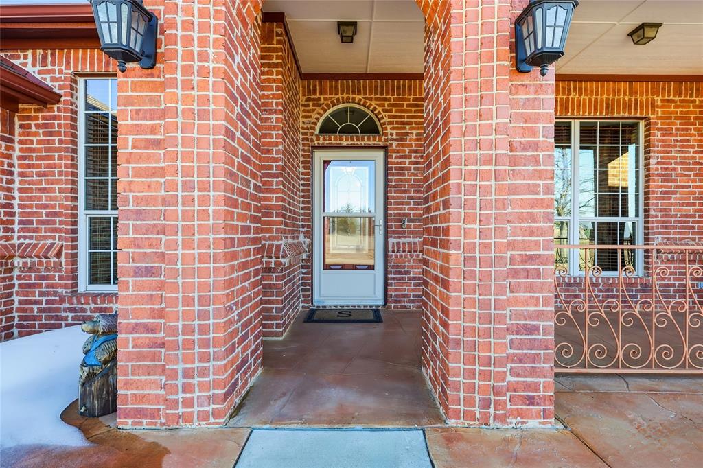 7915 Stone Ridge Drive Northlake, TX 76247 - Photo 3 of 40 a view of a door of the house
