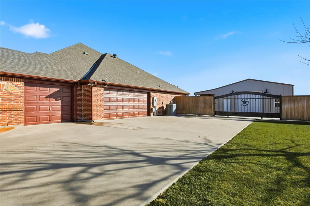 7915 Stone Ridge Drive Northlake, TX 76247 - Photo 5 of 40 a front view of a house with a yard