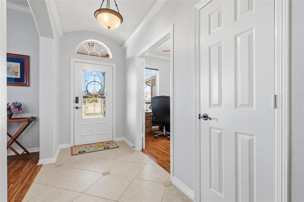 7915 Stone Ridge Drive Northlake, TX 76247 - Photo 6 of 40 a view of a hallway to a livingroom with furniture