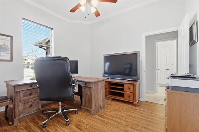 a view of a livingroom with furniture and a flat screen tv
