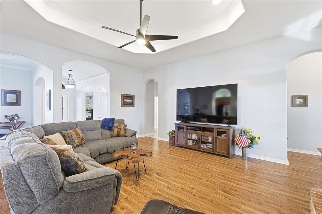 7915 Stone Ridge Drive Northlake, TX 76247 - Photo 10 of 40 a living room with furniture and a flat screen tv